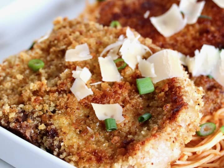 Italian breaded pork chops plated.