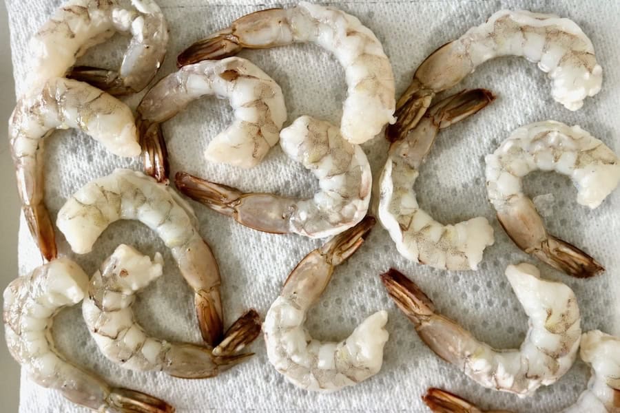 Fresh shrimp on paper towels.