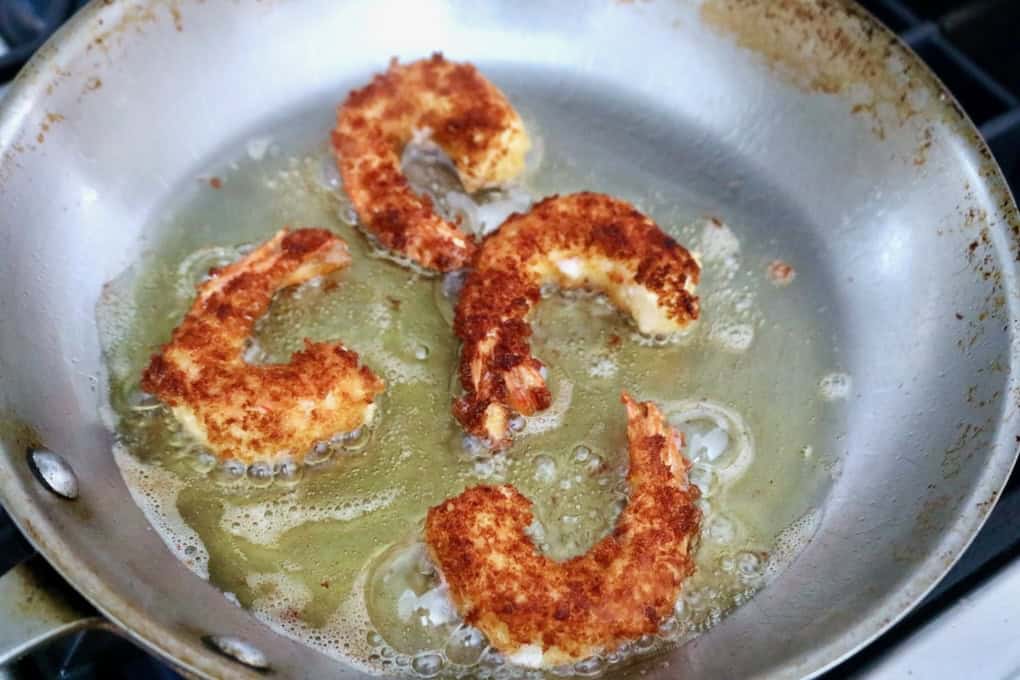 Frying shrimp.