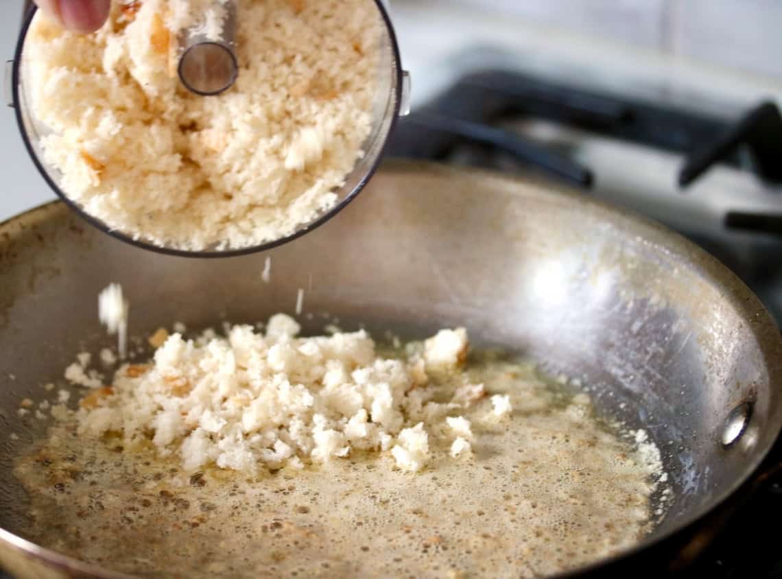 Toasting breadcrumbs in a skillet.