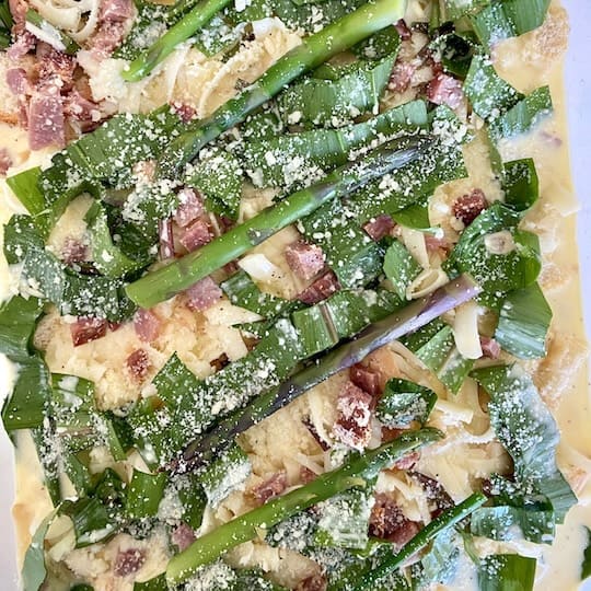 Crouton egg casserole ready to bake.