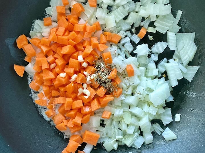 Diced carrots, onions, garlic and thyme.