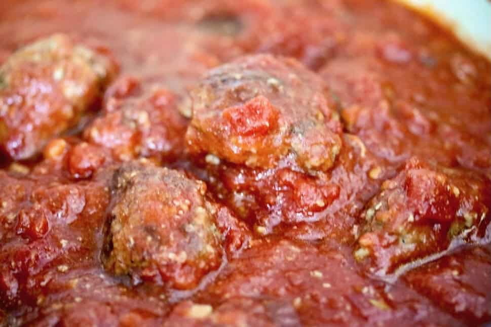 Homemade meatballs in sauce.