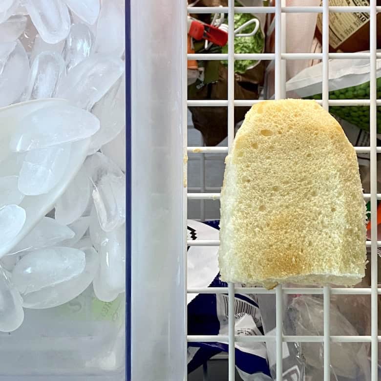 A loaf of bread sitting in the freezer.