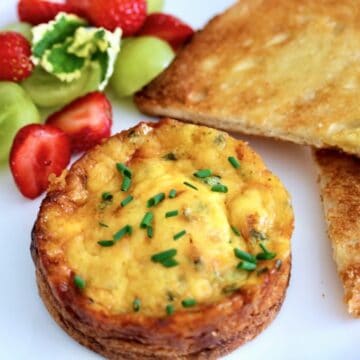 A breakfast dish with toast and strawberries.
