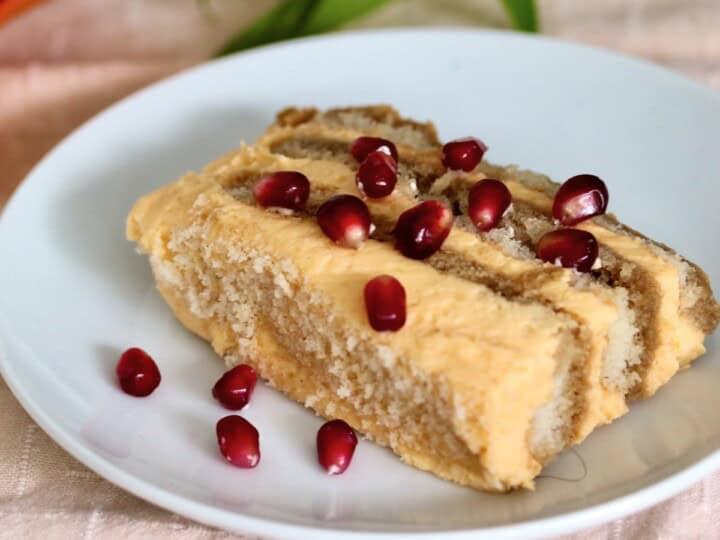 Pumpkin spice tiramisu garnished with pomegranate seeds.