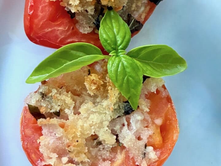 Bake stuffed tomatoes.