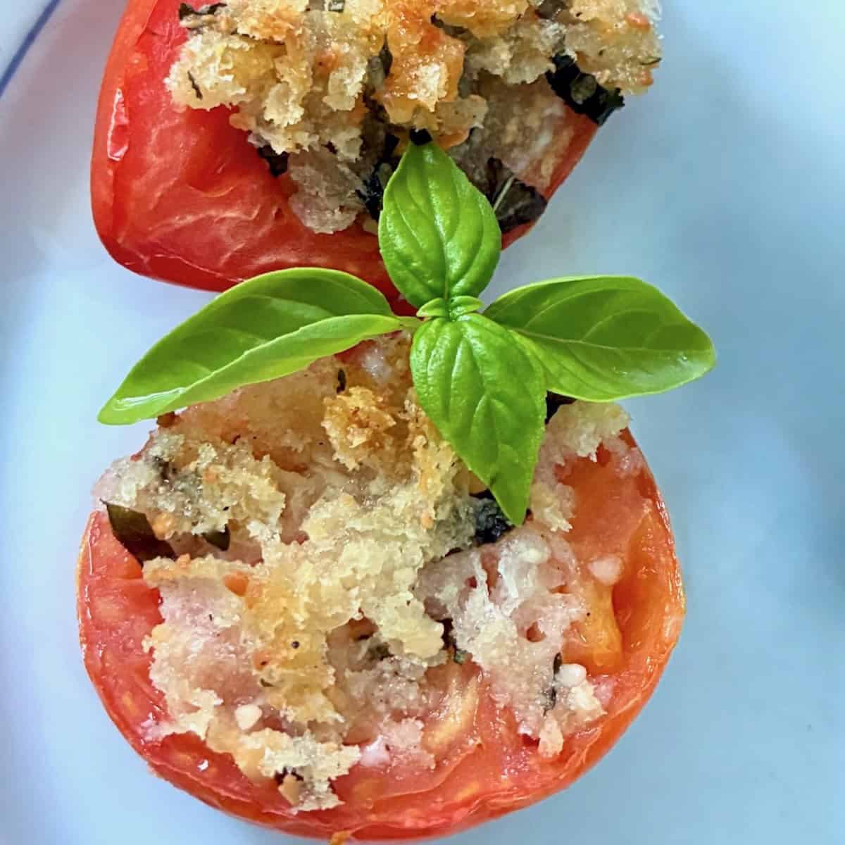 Bake stuffed tomatoes.