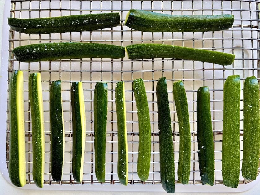 Zucchini on a wire rack.