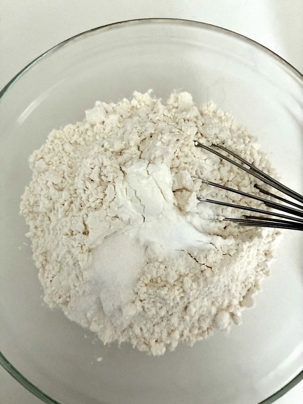 Whisking dry ingredients.