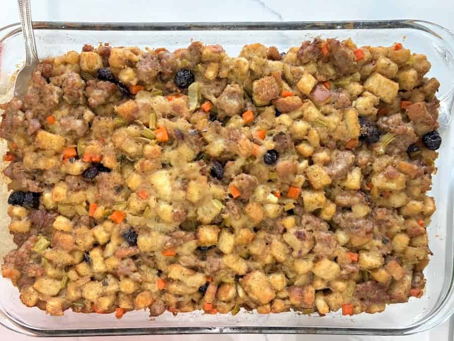 Bake sausage and apple stuffing with cranberries.